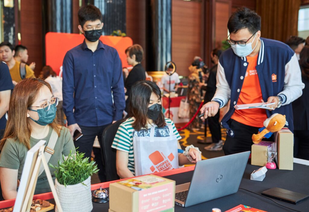 Tradehub founder Leon Wong right talking to visitors during the recent Shopee Seller Summit 2023